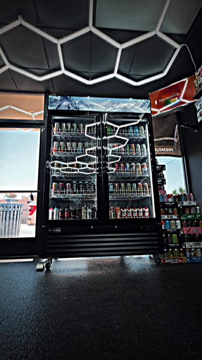 Ready-to-drink fridge stocked with energy and protein drinks